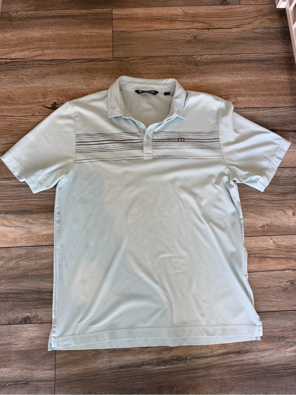 Travis Mathew’s Light Blue Men’s Polo Shirt